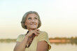 © aletia2011 - Portrait of a happy smiling senior woman outdoors