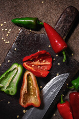 Sticker - Closeup shot of colorful peppers on cut board