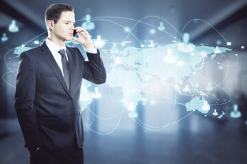 Poster - Businessman in a suit talking on the phone with a world map with rays in the background. International and worldwide trade concept