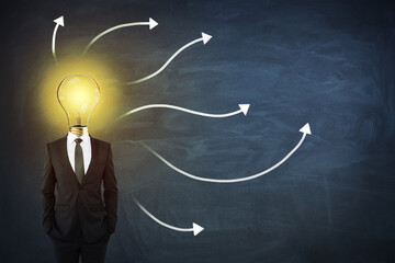 Poster - Sturtup and idea concept with man in black suit with light bilb on shoulders on blackboard with arrows background
