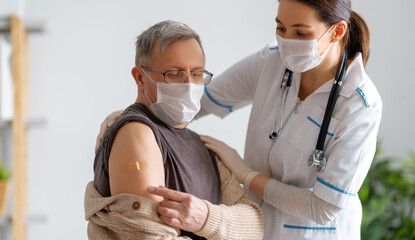 Wall Mural - Senior man after vaccination.