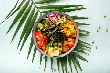 Wall Mural - Organic hawaiian spicy salmon poke bowl with rice and vegetables