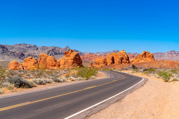 Wall Mural - Road through the sandstone Seven Sisters rock formations in the Valley of  Fire State Park located in Southern Nevada near Las Vegas.