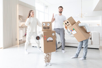 Wall Mural - Family playing robots at home