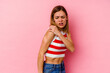 © Asier - Young caucasian woman isolated on pink background having a shoulder pain.