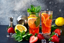 Cold Summer Cocktail With Fresh Strawberry, Lemon And Mint.