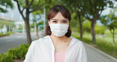 Wall Mural - female wearing mask with smiling