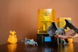 © phoenix021 - 3D printer and printed figurines