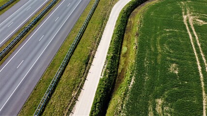 Empty Highway in a rural landscape that connects transport and transport between cities by means of asphalt infrastructure.