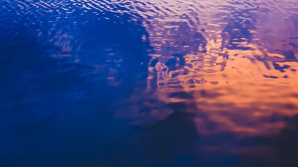 background texture of a calm deep blue ocean with surface of the sea water