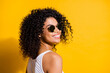 © deagreez - Turned photo of charming afro american woman happy smile wear white tank-top isolated on vibrant yellow color background
