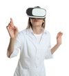 © New Africa - Young woman using virtual reality headset on white background