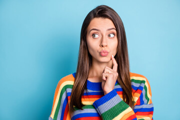 Sticker - Portrait of attractive curious girlish brown-haired girl pout lips thinking copy space isolated over bright blue color background