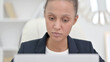 © stockbakers - African Businesswoman Working on Laptop, Close Up
