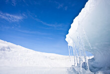 Ice Wave On Lake Baikal, Winter Landscape With Icicles  Blue Sky