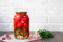 Pickled Tomatoes In A Glass Jar. Homemade.