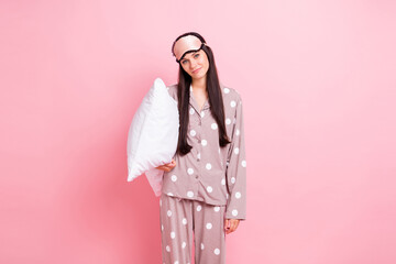 Sticker - Photo of sweet charming young lady nightwear mask holding big white pillow isolated pink color background