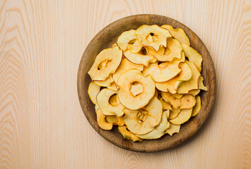 Sticker - Wooden bowl of round dried slices of apple