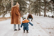 Canada, Ontario, Parents With Baby Boy Going On Winter Walk