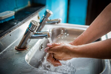 UK, England, Devon, Close-up Of Woman Washing Hands