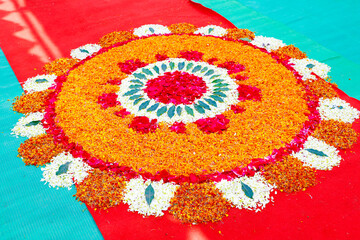 flower and green leaf decoration on door for welcome at wedding ceremony