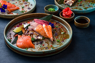 Wall Mural - Sashimi set, Japanese food sashimi a traditional dish of raw fish served on the table with copy space