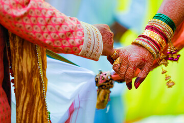 Indian couple hand in wedding Satphera ceremony in hinduism