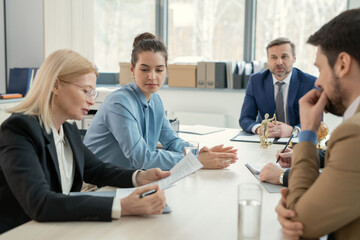 Poster - Analyzing document at meeting with lawyers