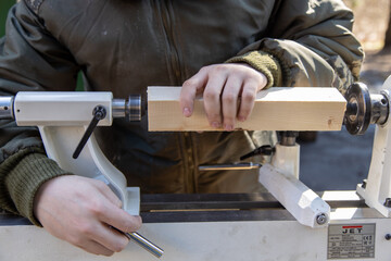 carpenter at work on wood