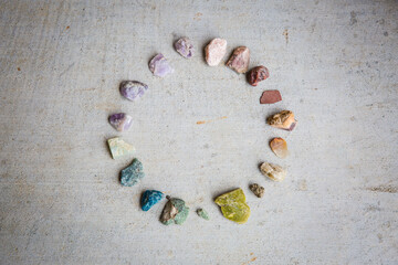 Rocks and gems arranged in a circle color wheel
