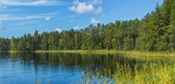 Fototapeta Konie - Panoramic view of beautiful forest lake in Russia.