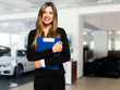 Saleswoman with folder and auto show background