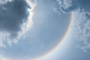 Wall Mural - The sky with clouds and rainbow lights