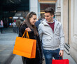 Young couple shopping in an urban street