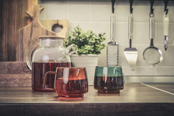 Wall Mural - Glass teapot full of black tea