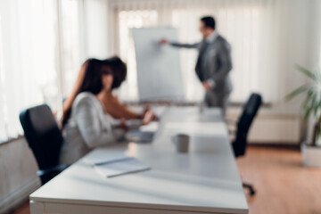 Sticker - Blurred background image of business people at meeting