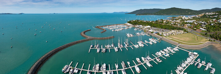 Wall Mural - Aerial panoramic view of the marina at beautiful Airlie Beach in Queensland Australia