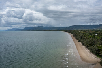 Wall Mural - Dramatic clouds over Four Mile Beach in Port Douglas, Far North Queensland, Australia