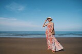 Fototapeta Pomosty - woman on the beach
