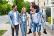 © blackday - Group of best friends are having fun while walking by city street