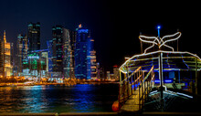 Colorful Skyline of Doha Qatar City during night during summer.