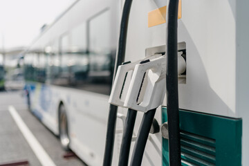 Wall Mural - bus is charging in power station