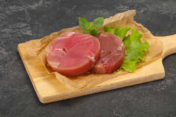 Raw tuna round steak for grill