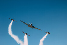 Vintage Biplane Does Loop Stunt With Smoke Trails. Airplane Air Show