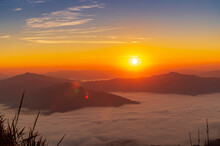 Sunrise / Sunset Landscape Of The Mountain And Sea Of Mist In Winter Sunrise View From Top Of Doi Pha Tang Mountain , Chiang Rai, Thailand
