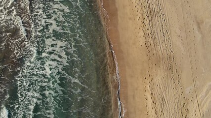 Wall Mural - Aerial view of Patara beach, top down view of clear turquoise sea and waves on beach