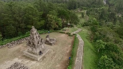 Wall Mural - Cinematic aerial footage view Hindu temple from drone flying parallax point of view movement