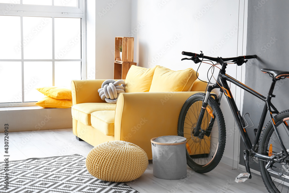 Bicycle in interior of stylish living room