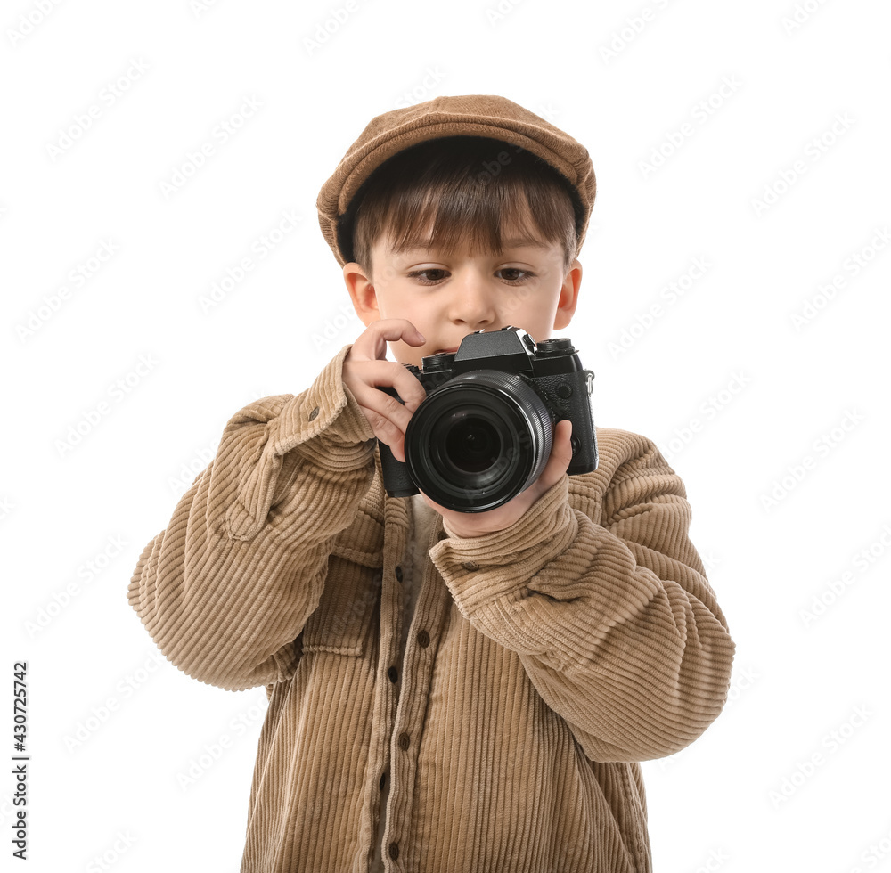 Cute little photographer on white background