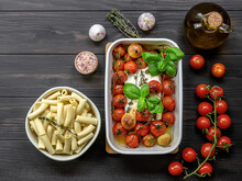 Trending viral Feta baked pasta recipe made of cherry tomatoes, feta cheese, garlic, and herbs in a casserole dish. Great sauce for rigatoni or penne. 